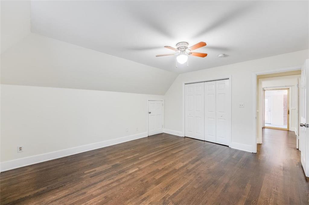 5550 Koweta Road South Fulton, GA 30349 - Photo 41 of 58 wooden floor in an empty room with a window