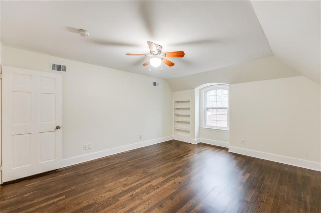5550 Koweta Road South Fulton, GA 30349 - Photo 43 of 58 an empty room with wooden floor and window