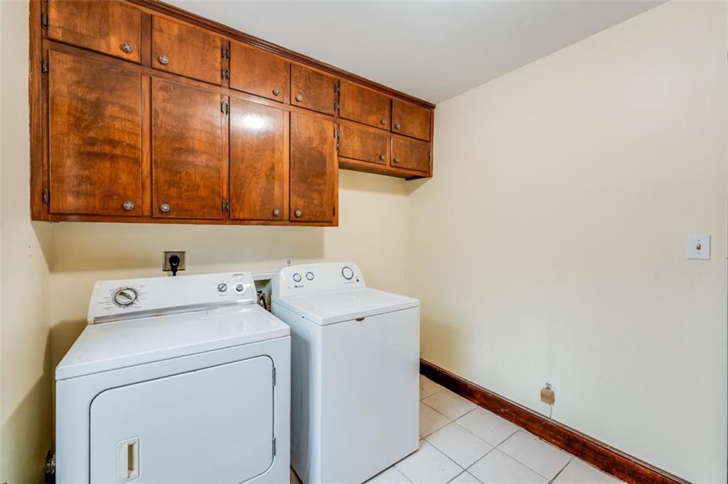5550 Koweta Road South Fulton, GA 30349 - Photo 58 of 58 a utility room with dryer and washer