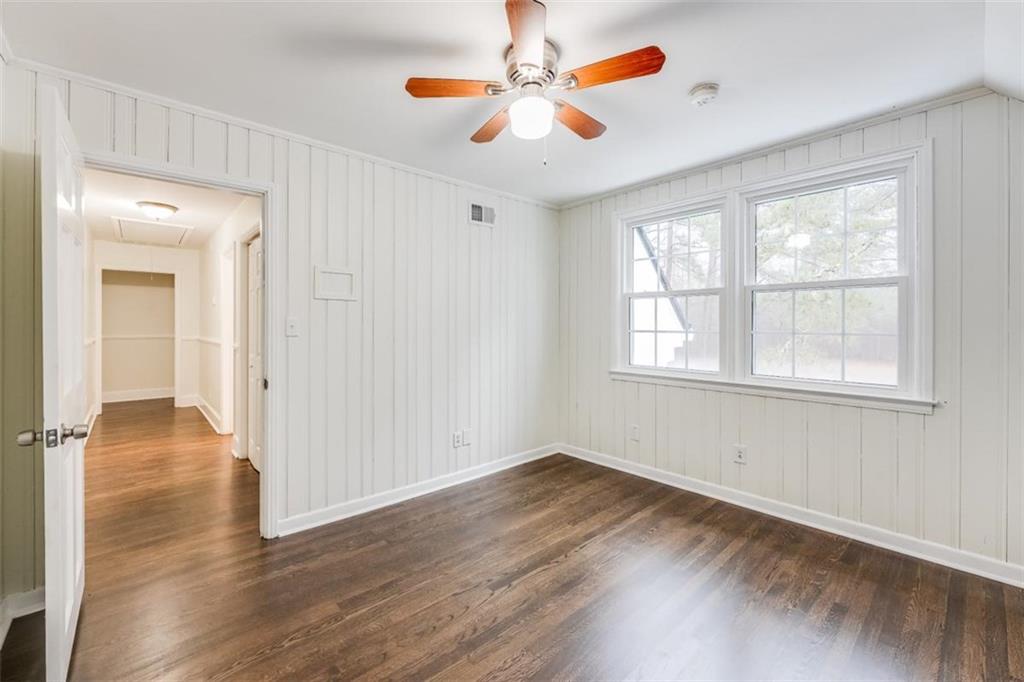 5550 Koweta Road South Fulton, GA 30349 - Photo 10 of 58 wooden floor in an empty room with a window