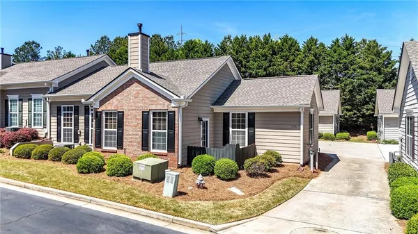 front view of a house with a yard