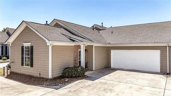 a front view of house with garage