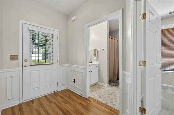 a view of a bedroom from the hallway
