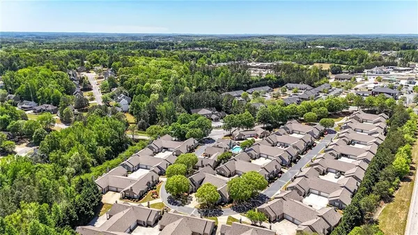 an aerial view of a city with lots of residential buildings