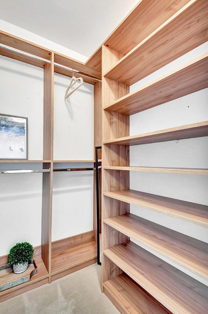 3567 Commodore Circle Delray Beach, FL 33483 - Photo 46 of 76 a view of walk in closet with empty racks