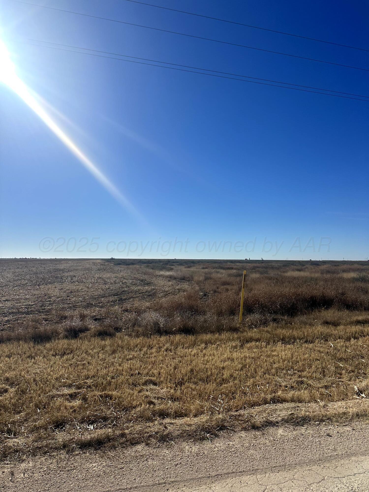 55 County Road B Perryton, TX 79070 - Photo 2 of 6 a view of ocean and a mountain