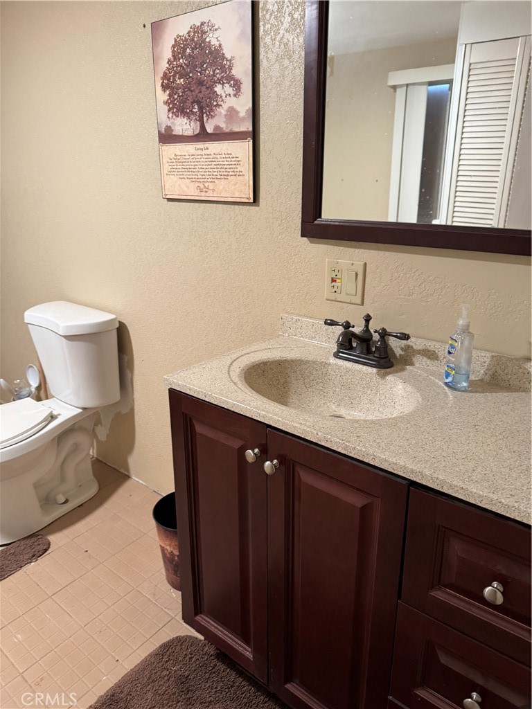 3110 Wilson Road Twentynine Palms, CA 92277 - Photo 16 of 34 a bathroom with a sink and a mirror