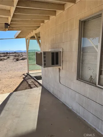 a view of a balcony with a sink and stove