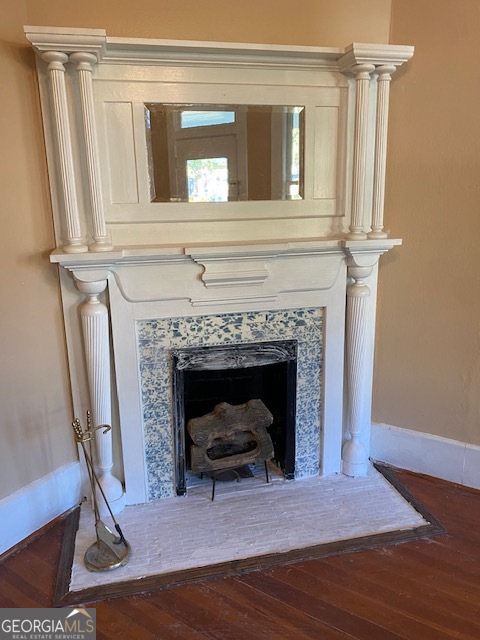 252 Edwards Street Elberton, GA 30635 - Photo 11 of 43 a living room with a fireplace and a rug