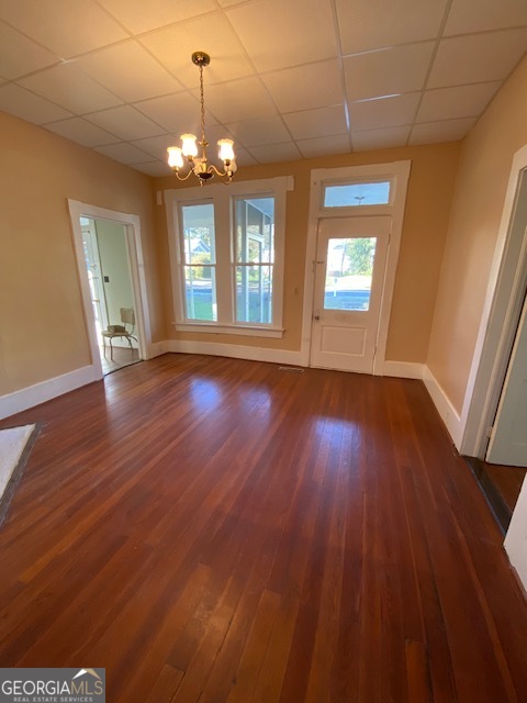 252 Edwards Street Elberton, GA 30635 - Photo 12 of 43 a view of an empty room with wooden floor and a window