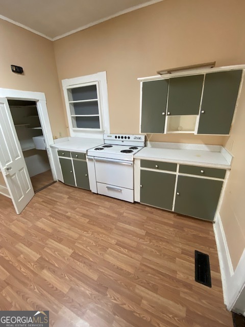 252 Edwards Street Elberton, GA 30635 - Photo 34 of 43 a view of a kitchen with wooden floor and electronic appliances