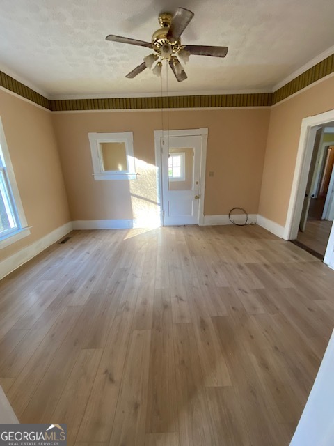 252 Edwards Street Elberton, GA 30635 - Photo 38 of 43 a view of empty room with wooden floor