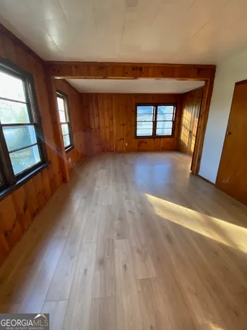 a spacious bathroom with a large tub and shower