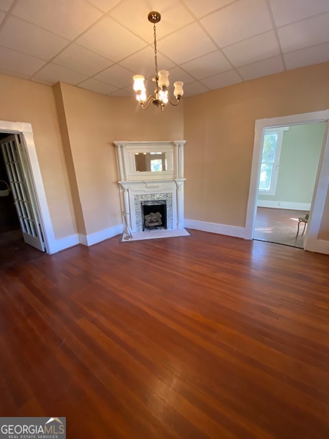 252 Edwards Street Elberton, GA 30635 - Photo 10 of 43 a view of a livingroom with wooden floor fireplace and staircase