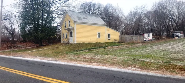 a view of backyard of house