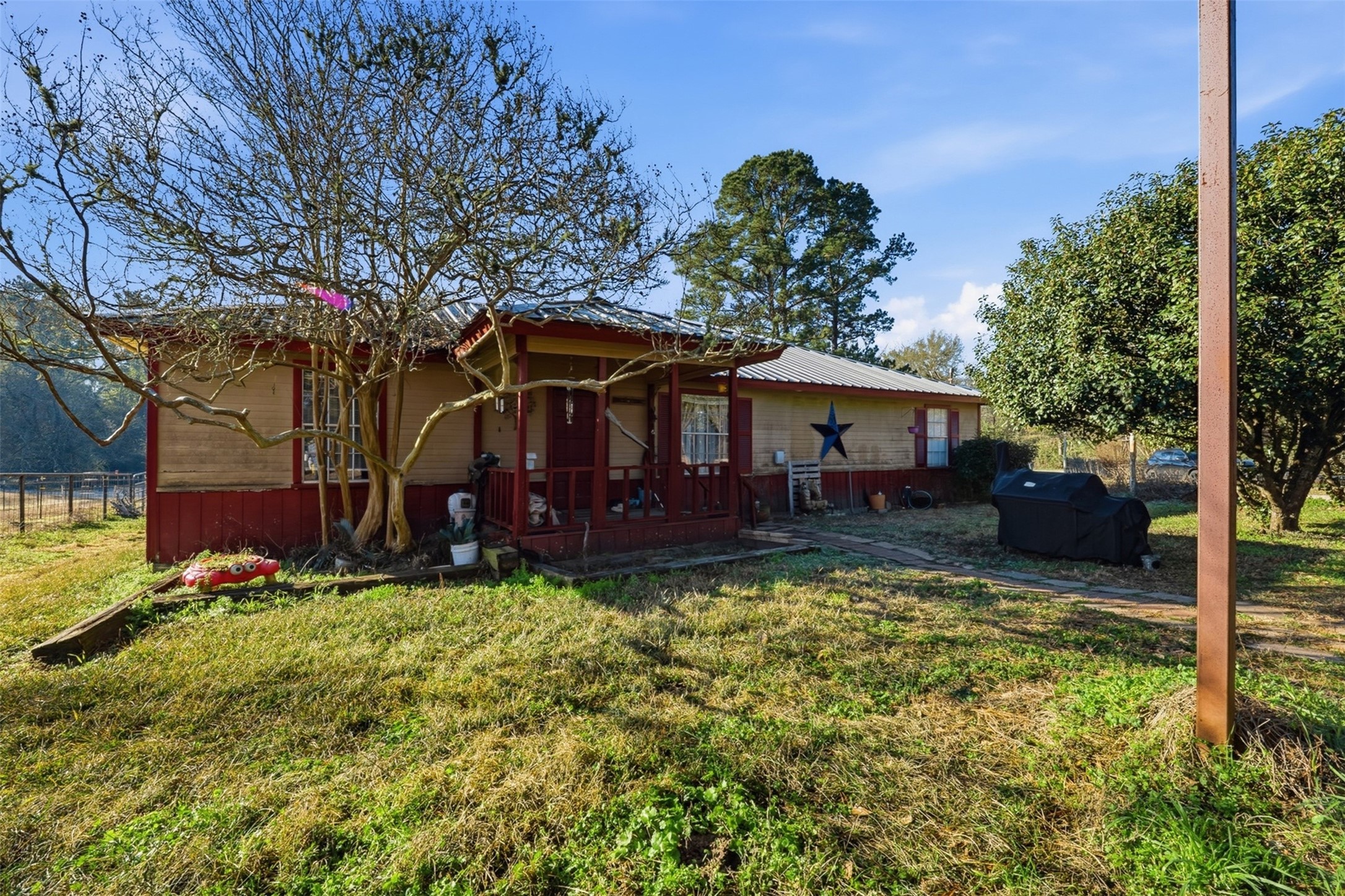 4027 Spring Branch Road Montgomery, TX 77316 - Photo 21 of 31 a view of house with outdoor seating