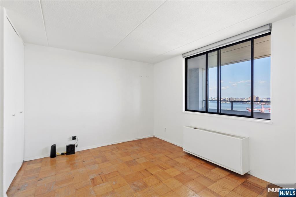 250 Gorge Road, Unit 18K Cliffside Park, NJ 07010 - Photo 11 of 30 a view of an empty room with window