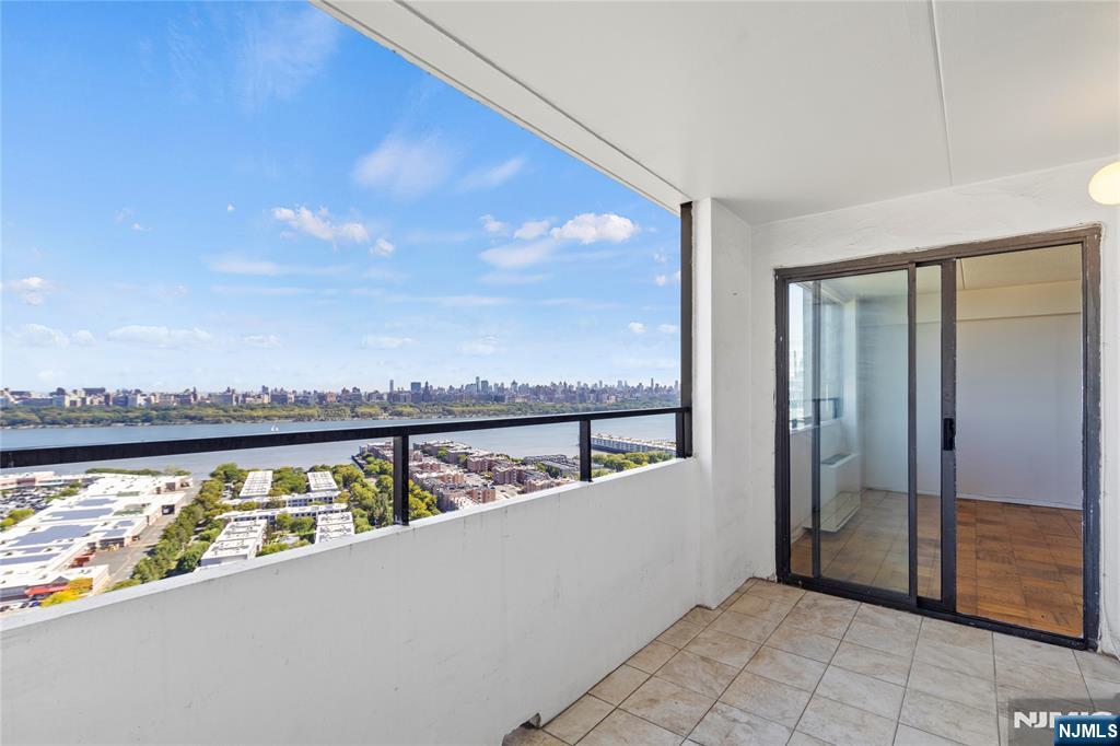 250 Gorge Road, Unit 18K Cliffside Park, NJ 07010 - Photo 16 of 30 a view of roof deck with island and city view