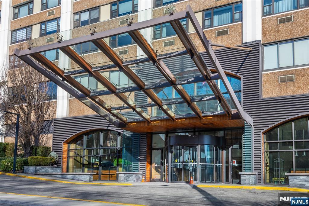 250 Gorge Road, Unit 18K Cliffside Park, NJ 07010 - Photo 2 of 30 a view of a building with a swimming pool