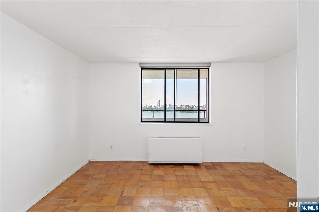 250 Gorge Road, Unit 18K Cliffside Park, NJ 07010 - Photo 10 of 30 a view of an empty room with a window