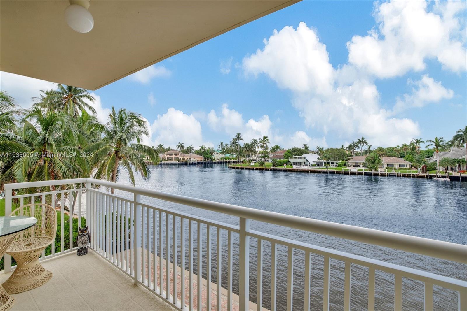 2611 North Riverside Drive, Unit 301 Pompano Beach, FL 33062 - Photo 25 of 31 a view of a lake from a balcony