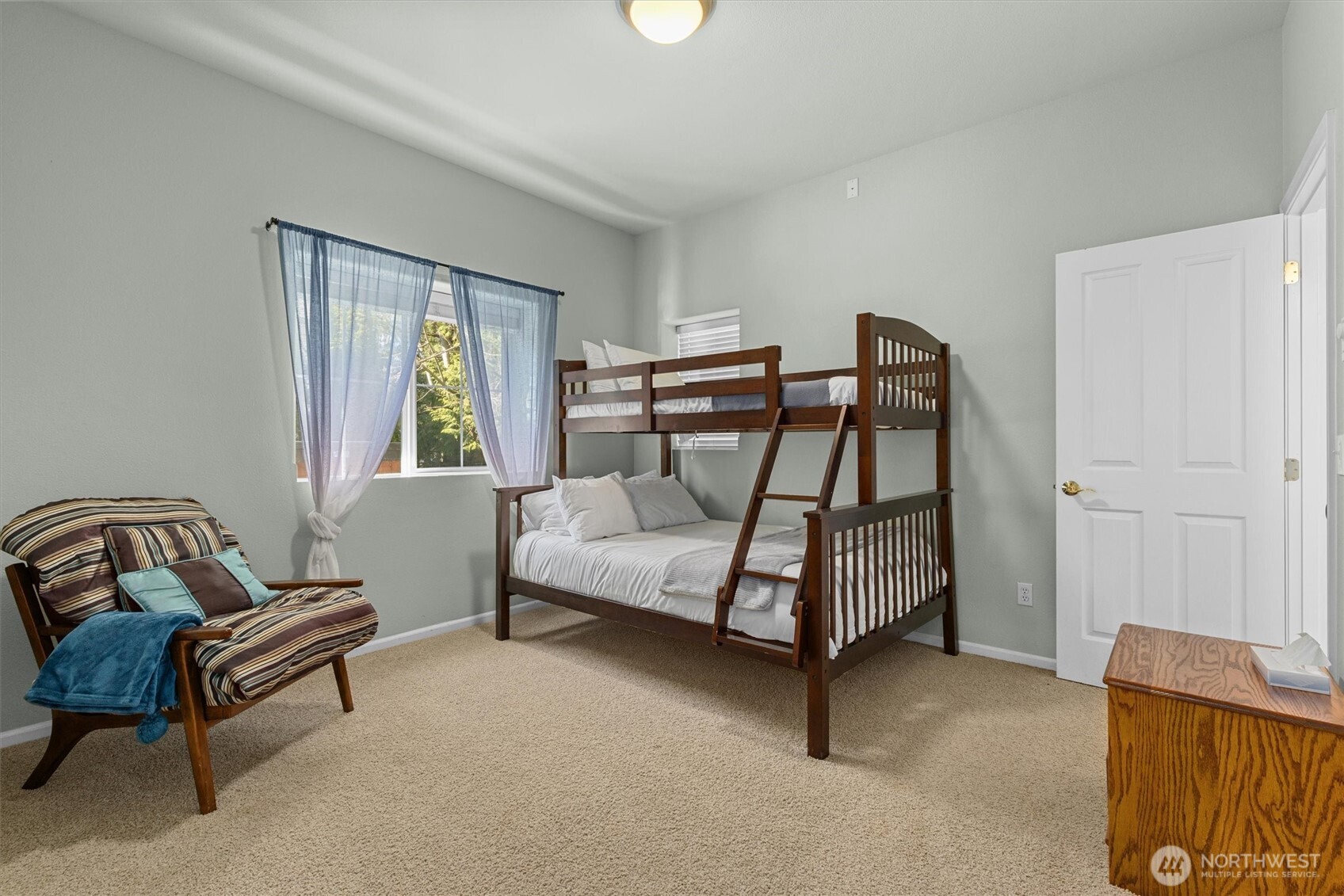 481 Maple Grove Road Port Angeles, WA 98363 - Photo 23 of 40 a bedroom with furniture and a window