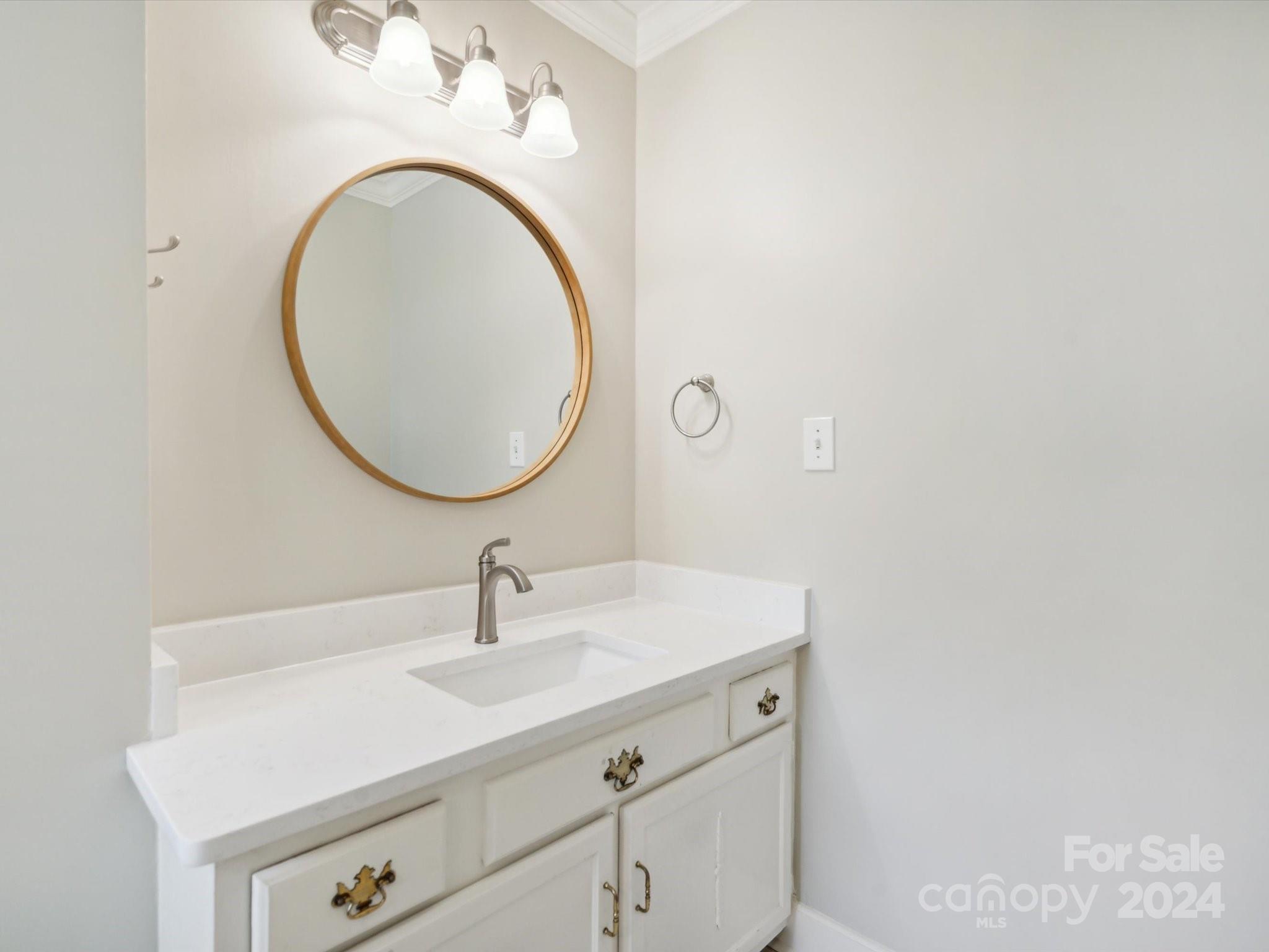 419 Neill Ridge Road Matthews, NC 28105 - Photo 32 of 41 a bathroom with a sink and a mirror