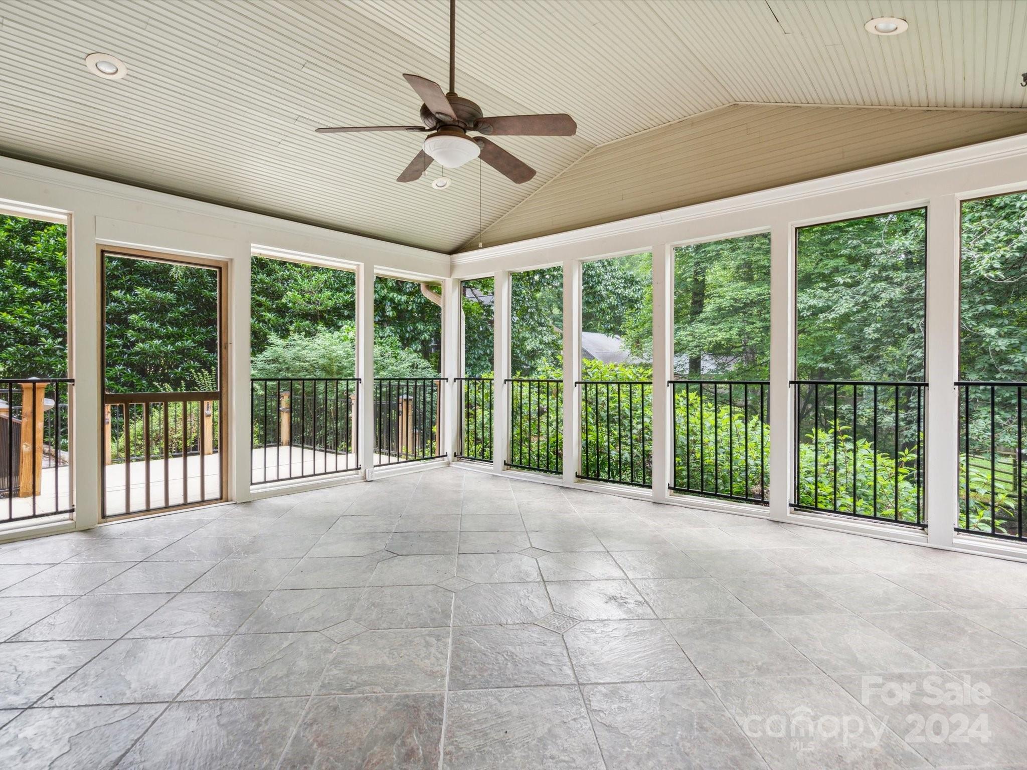 419 Neill Ridge Road Matthews, NC 28105 - Photo 36 of 41 a view of an empty room with a balcony
