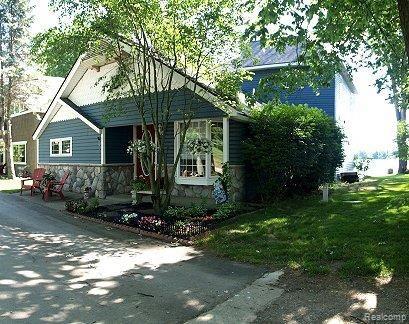 9623 Marshall Road South Lyon, MI 48178 - Photo 2 of 22 Roadside_Exterior_Still.jpg