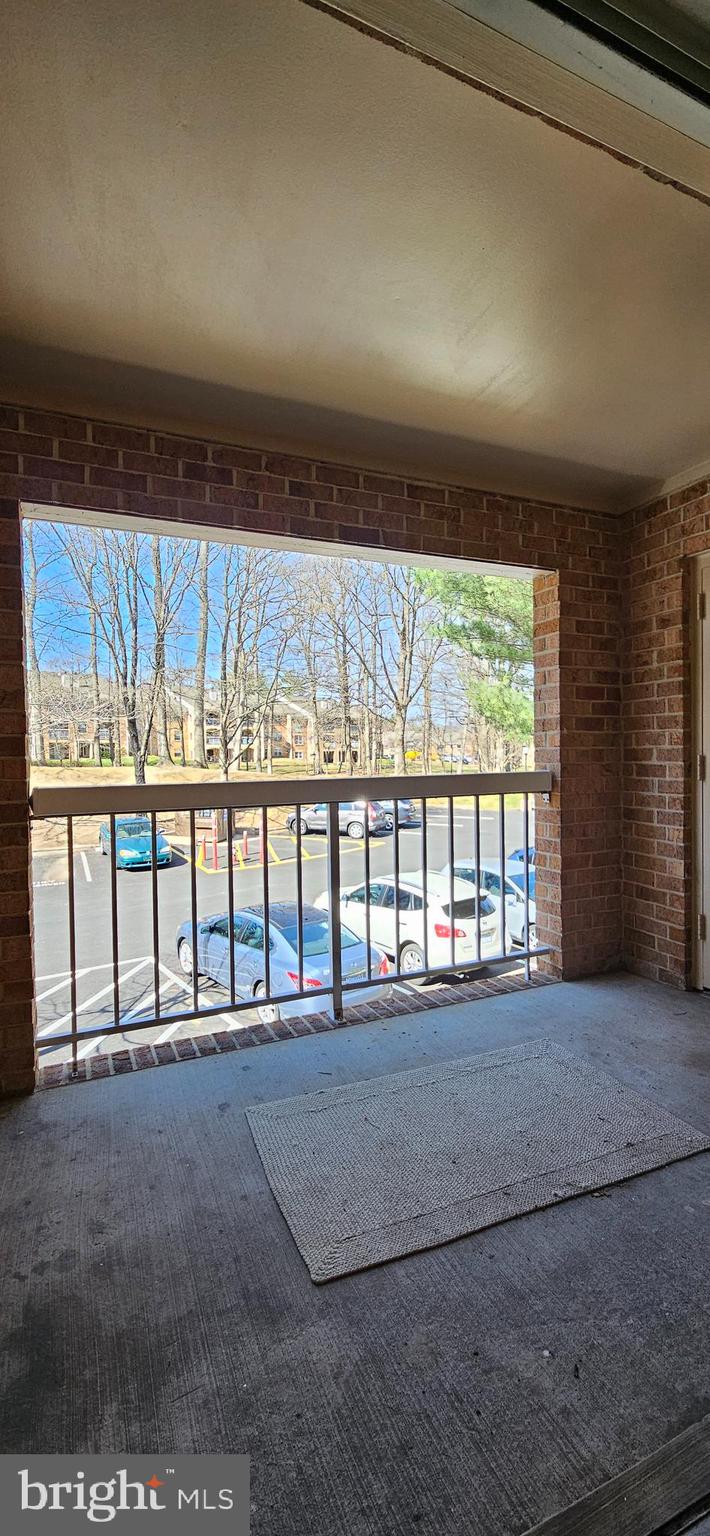5831 Cove Landing Road, Unit 301 Burke, VA 22015 - Photo 27 of 33 a view of an empty room with a window