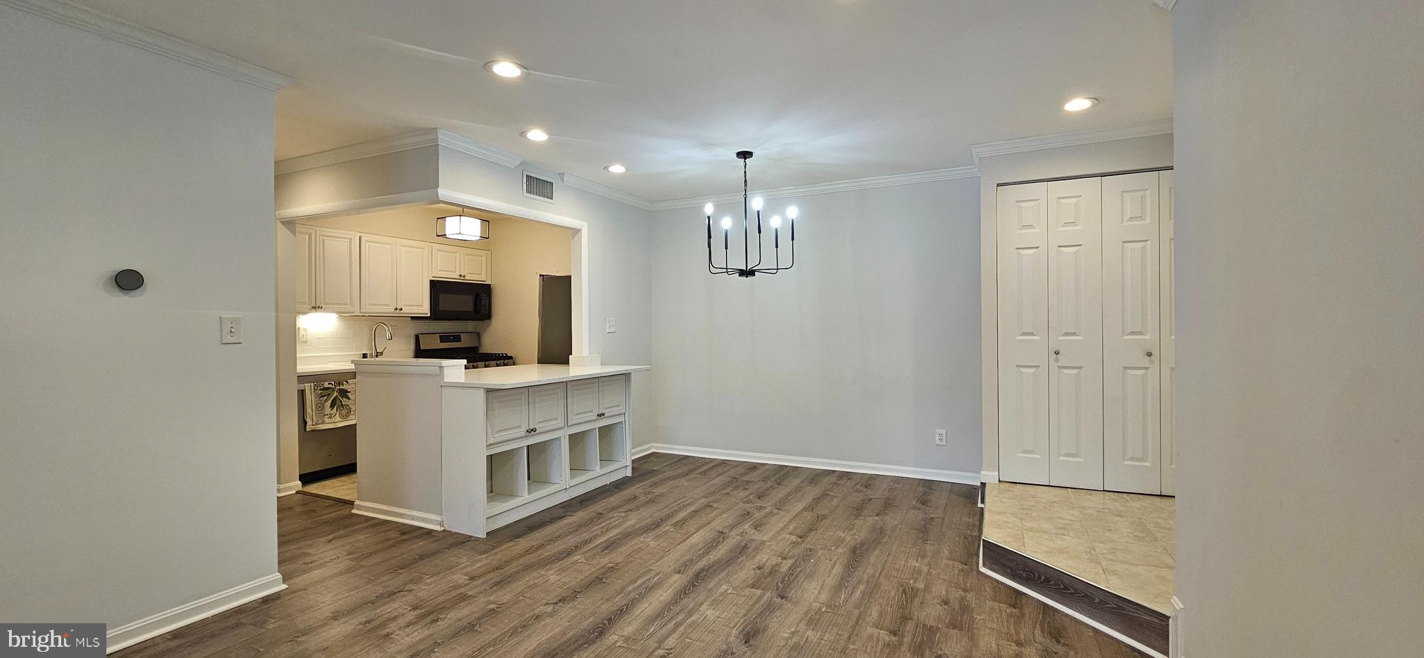 5831 Cove Landing Road, Unit 301 Burke, VA 22015 - Photo 7 of 33 a view of kitchen with sink