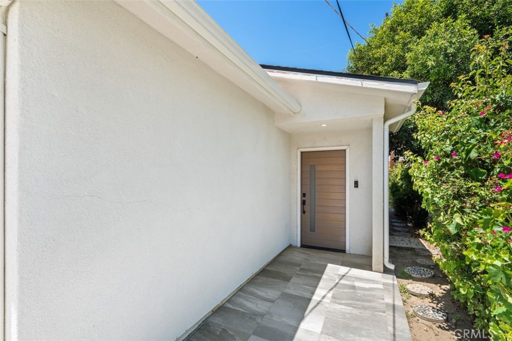 14021 Hartsook Street Sherman Oaks, CA 91423 - Photo 1 of 19 a view of house with backyard