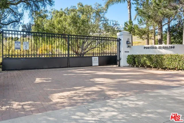 a view of swimming pool with a lake view