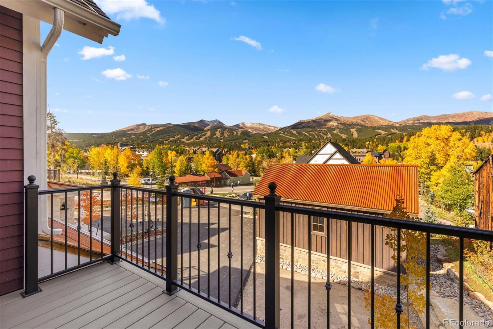 203 North Ridge Street, Unit B Breckenridge, CO 80424 - Photo 11 of 41 a view of a balcony with wooden floor and mountain view