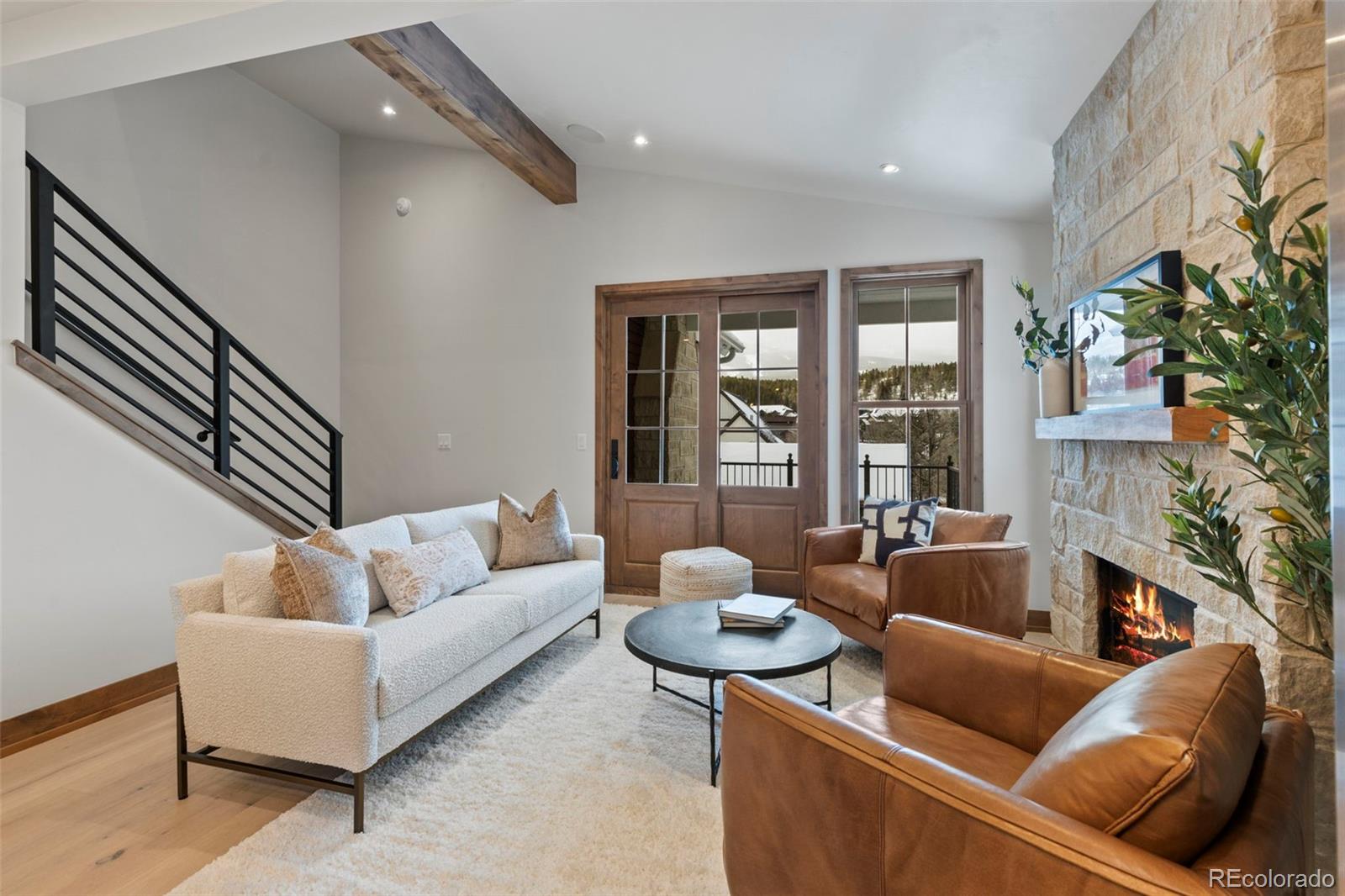 203 North Ridge Street, Unit B Breckenridge, CO 80424 - Photo 17 of 41 a living room with furniture and a large window