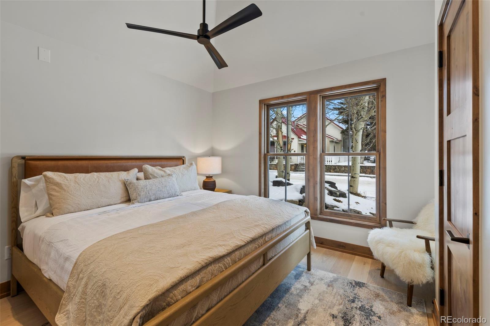 203 North Ridge Street, Unit B Breckenridge, CO 80424 - Photo 21 of 41 a bedroom with a large bed and a window