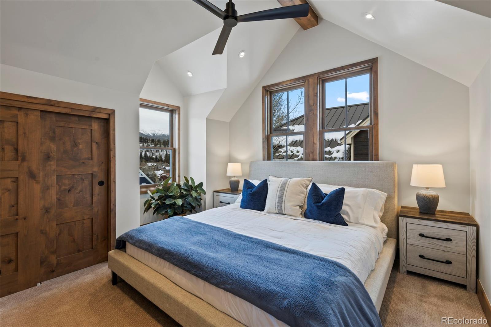 203 North Ridge Street, Unit B Breckenridge, CO 80424 - Photo 33 of 41 a bedroom with a bed and a window