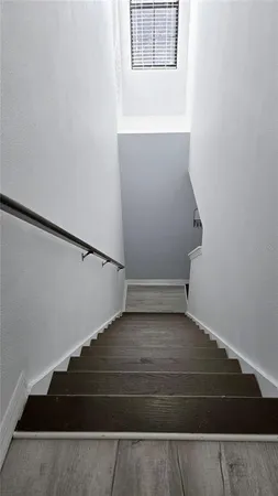 a view of entryway with wooden floor