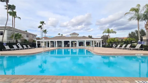 a view of a house with swimming pool