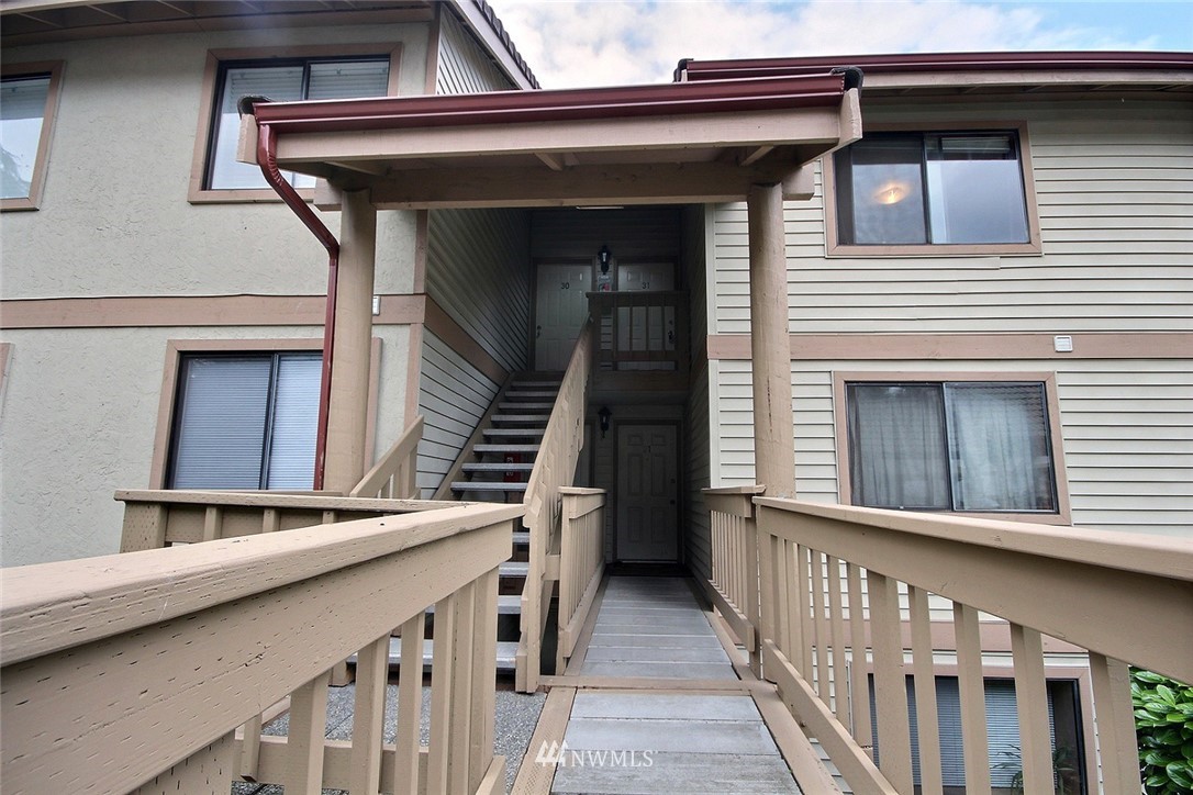17419 119th Lane Southeast, Unit E31 Renton, WA 98058 - Photo 16 of 18 a view of an entrance of the house