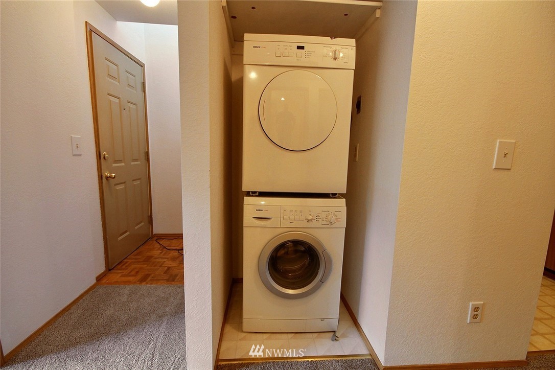 17419 119th Lane Southeast, Unit E31 Renton, WA 98058 - Photo 9 of 18 a utility room with dryer and washer