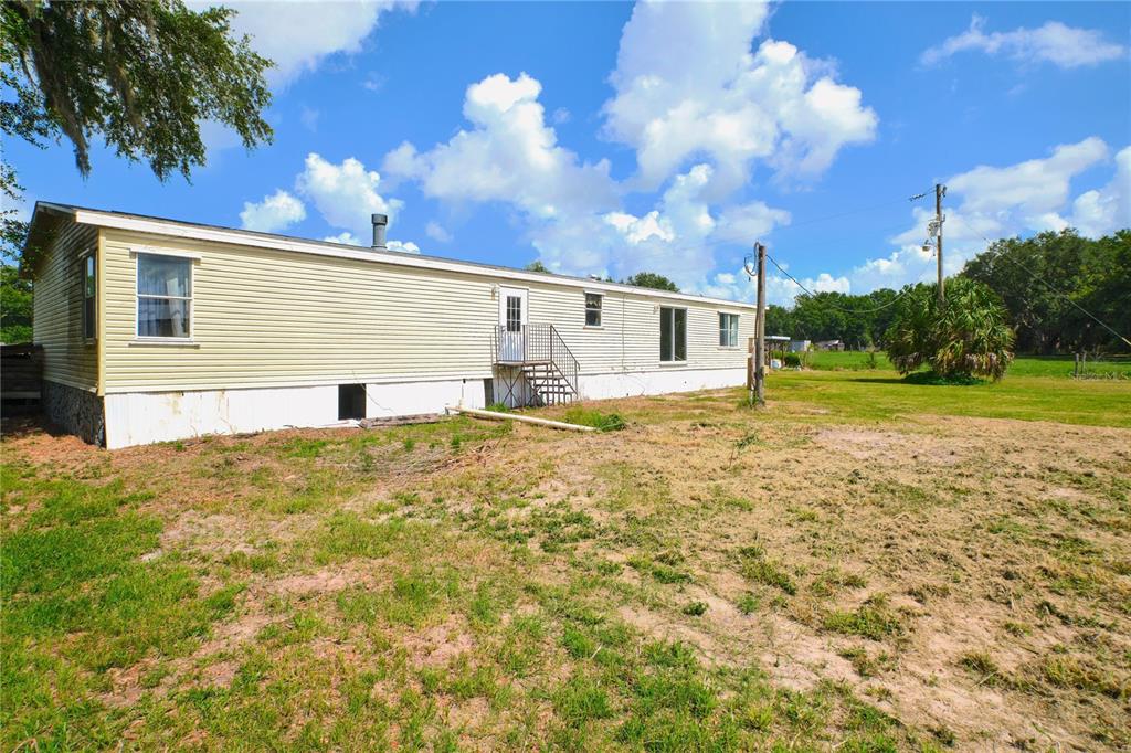 2701 Murphy Road Ona, FL 33865 - Photo 5 of 41 a view of a big yard with an outdoor space