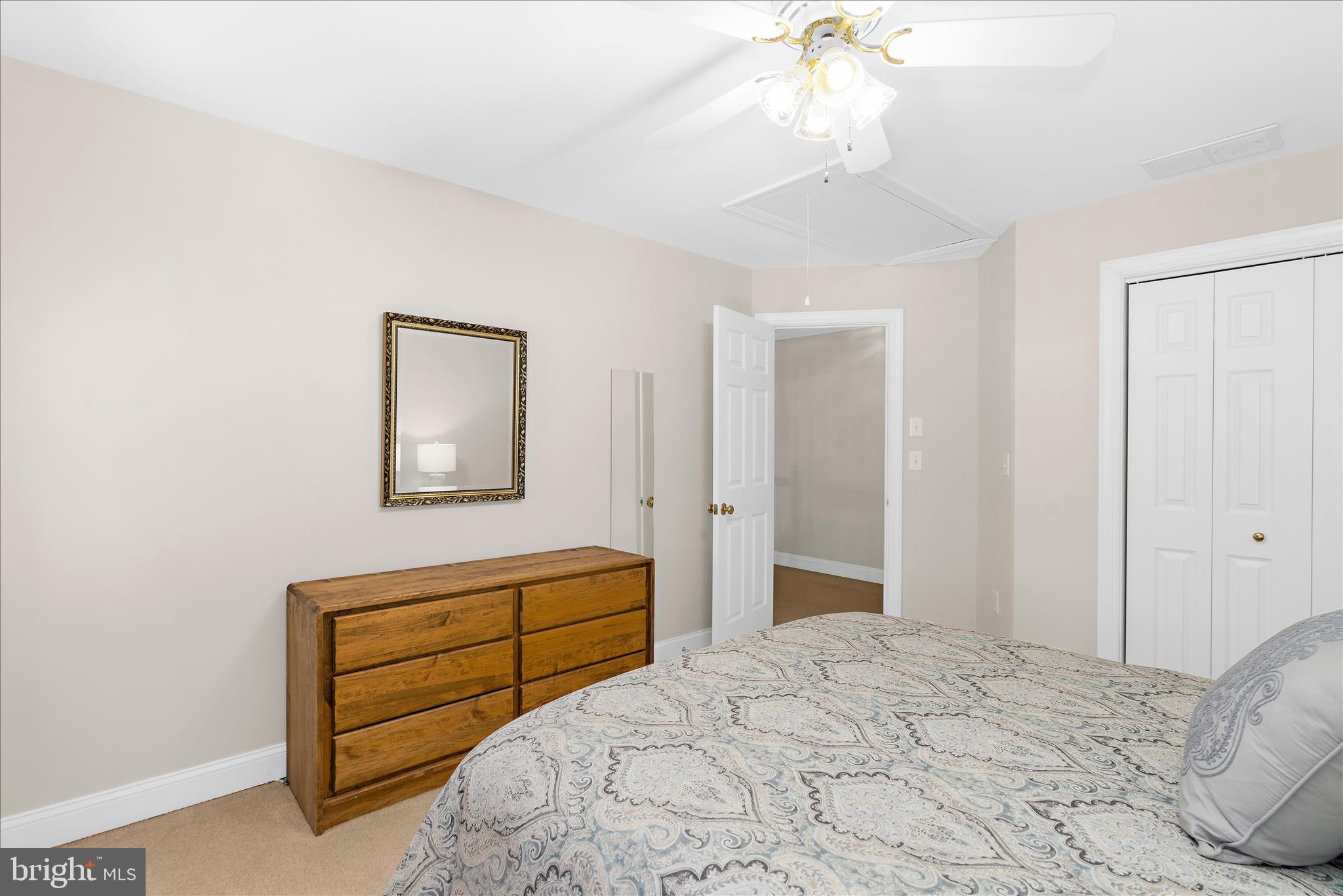 1848 Cherry Road Annapolis, MD 21409 - Photo 20 of 57 a bedroom with a bed and a chandelier