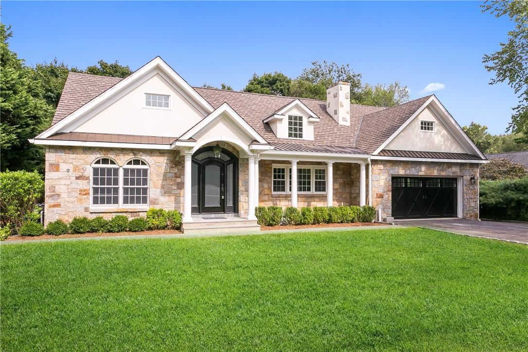 front view of a house and a yard