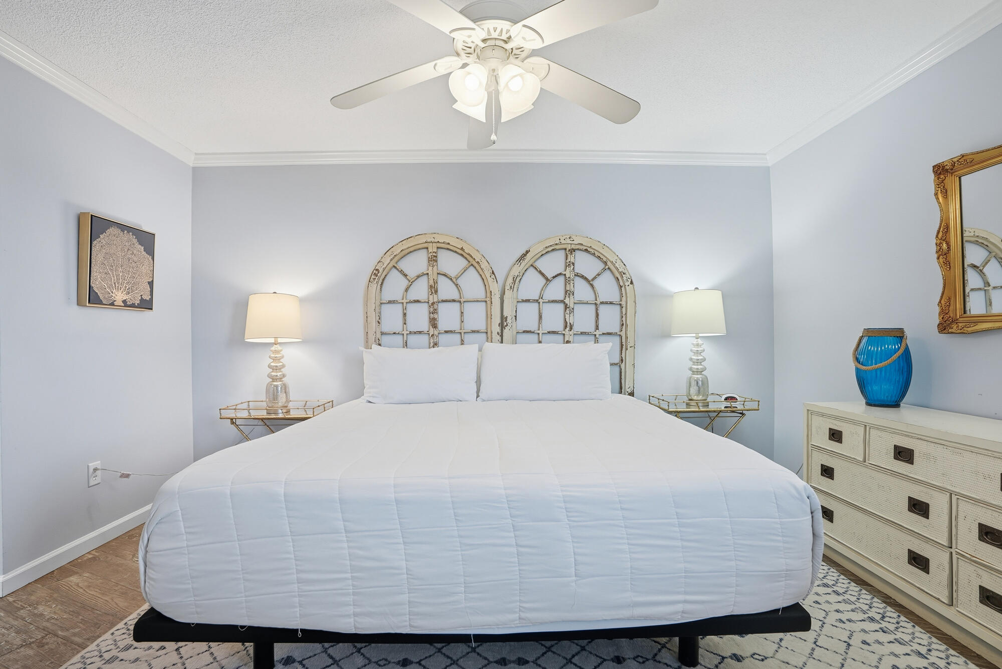 11483 Front Beach Road, Unit 105 Panama City Beach, FL 32407 - Photo 11 of 41 a bedroom with a bed and window