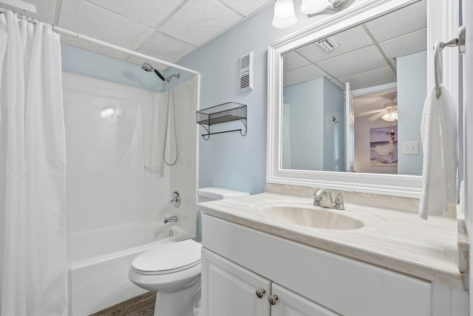 11483 Front Beach Road, Unit 105 Panama City Beach, FL 32407 - Photo 18 of 41 a bathroom with a sink toilet tub and shower
