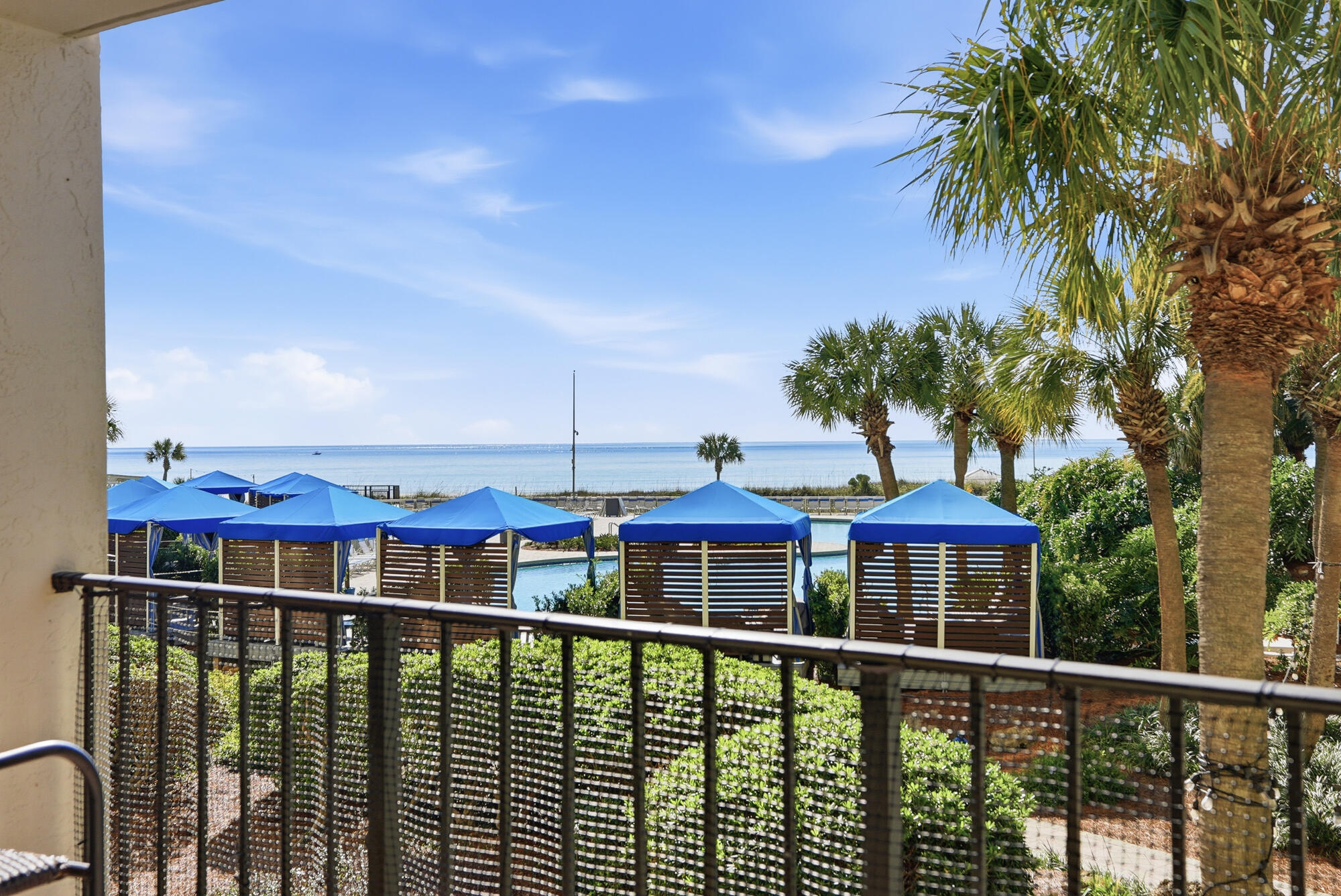 11483 Front Beach Road, Unit 105 Panama City Beach, FL 32407 - Photo 20 of 41 a view of a balcony with chairs
