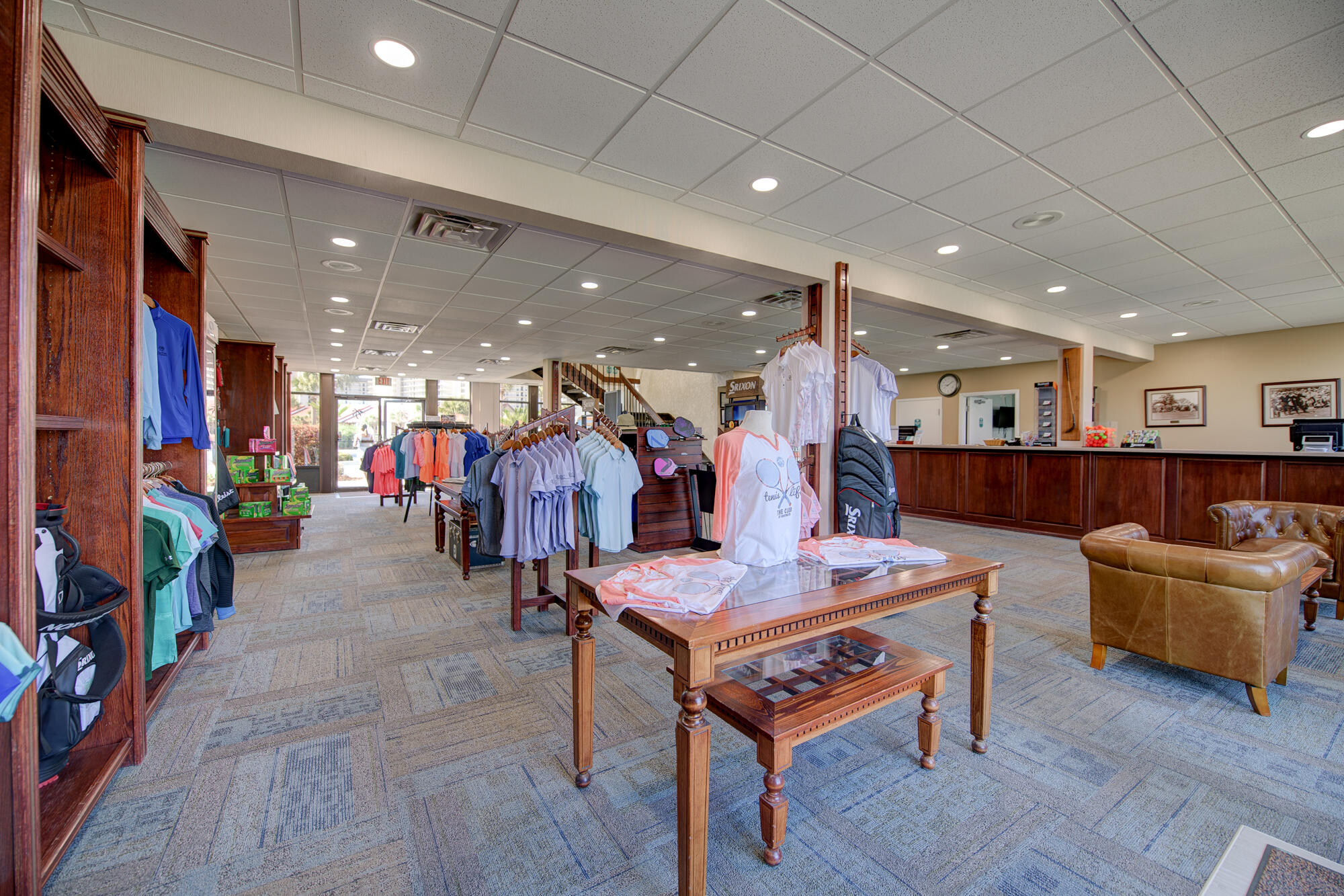 11483 Front Beach Road, Unit 105 Panama City Beach, FL 32407 - Photo 34 of 41 a living room with furniture and a flat screen tv