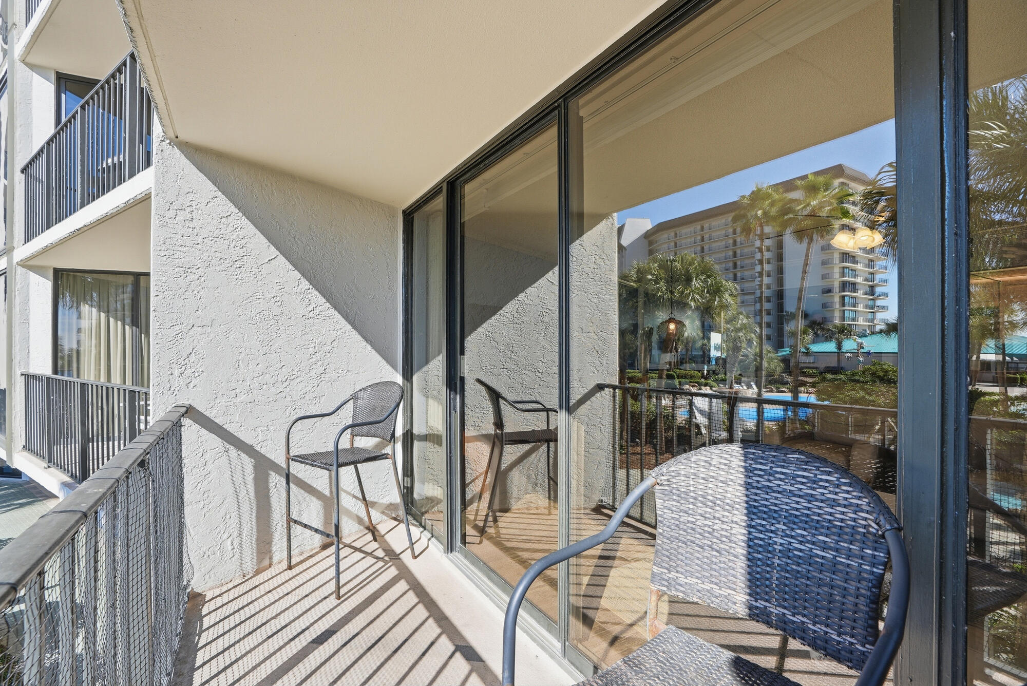 11483 Front Beach Road, Unit 105 Panama City Beach, FL 32407 - Photo 4 of 41 a view of balcony with furniture