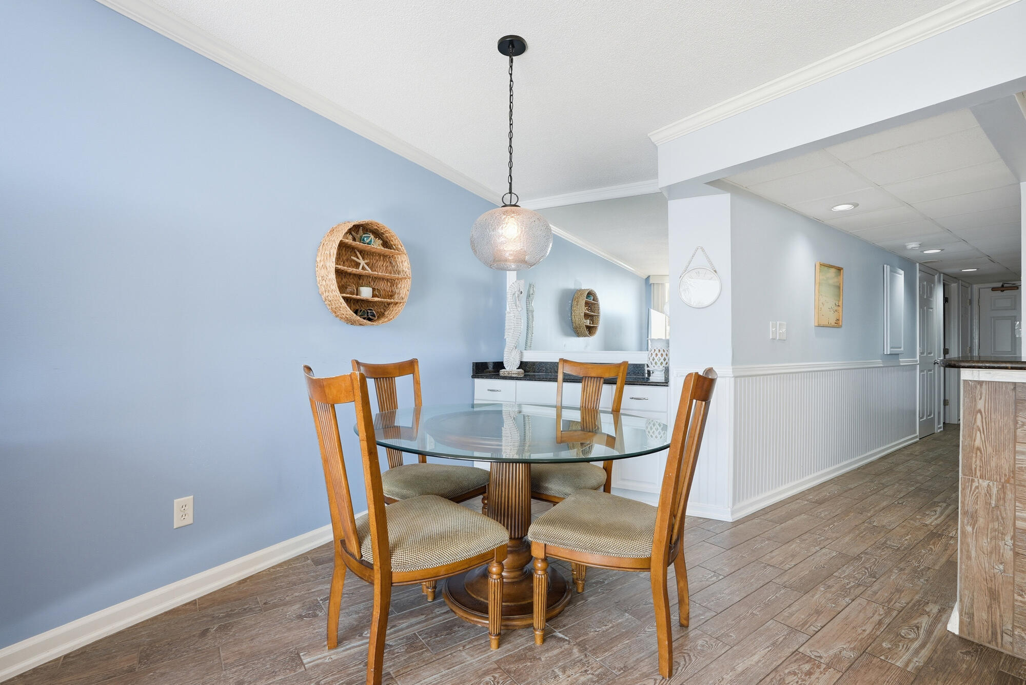 11483 Front Beach Road, Unit 105 Panama City Beach, FL 32407 - Photo 10 of 41 a view of a dining room with furniture